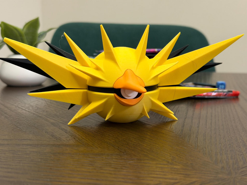 Zapdos-inspired Poké Ball collectible detail view
