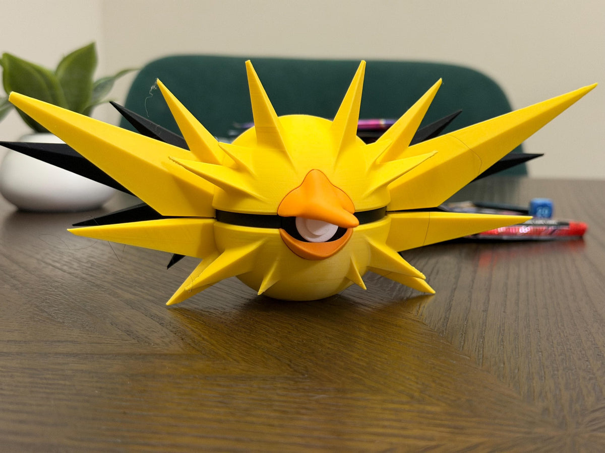 Zapdos-inspired Poké Ball collectible detail view